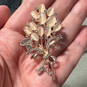 Elegant Gold and Cream Brooch